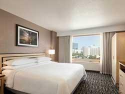 1 King 1 Bedroom Suite - Non-Smoking, Mobility Accessible, Roll-In Shower